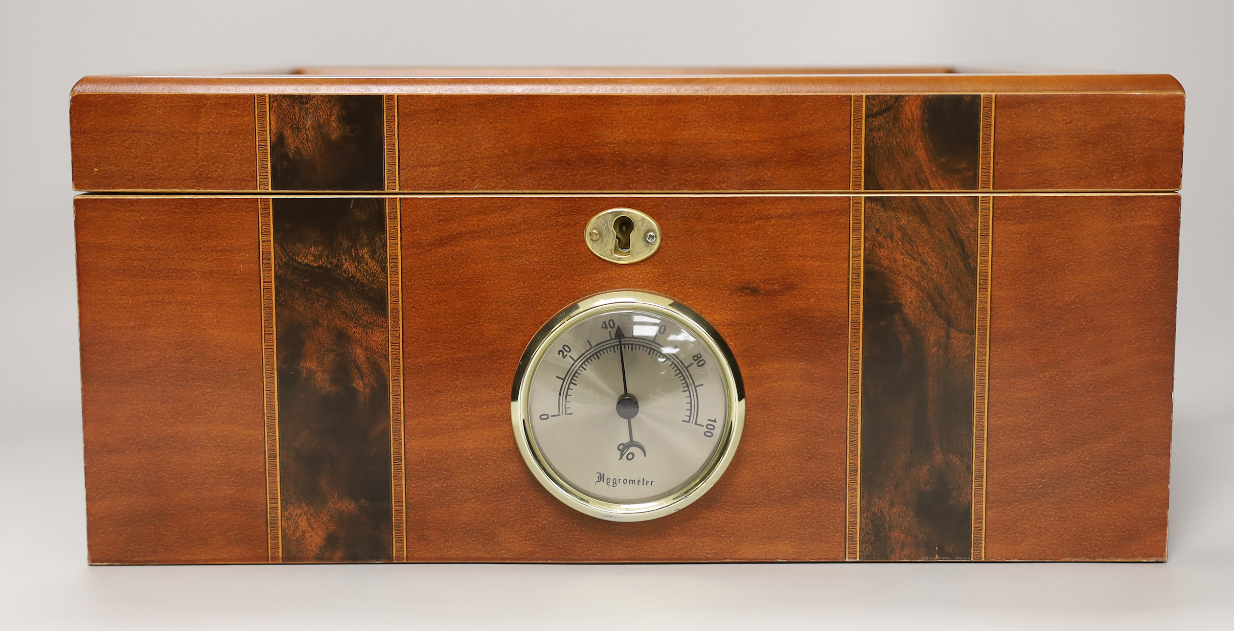 A sealed case of Monte Cristo Habana cigars together with a humidor, the humidor 16cm high x 34.5cm wide